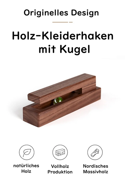 Origineller Handtuchhalter mit Kugel